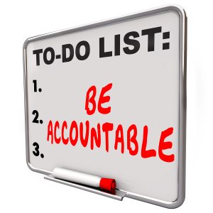 Be Accountable words on a to-do list dry erase board telling you to take responsibility, credit or blame for a job, task or project